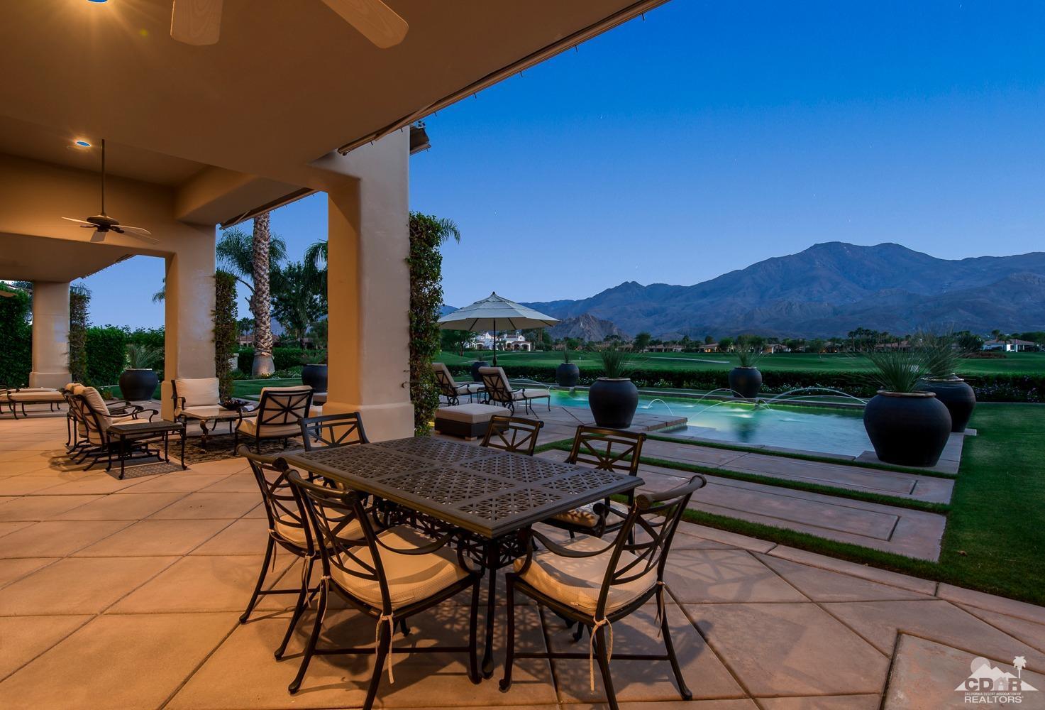 80515 Weiskopf La Quinta, CA 92253 - Photo 8 of 46 a view of chairs and tables in the patio