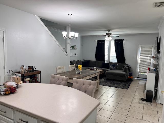 1101 East Parmer Lane, Unit 306 Austin, TX 78753 - Photo 12 of 30 a living room with furniture and a chandelier