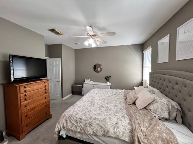 1101 East Parmer Lane, Unit 306 Austin, TX 78753 - Photo 19 of 30 a bedroom with a bed and a flat screen tv