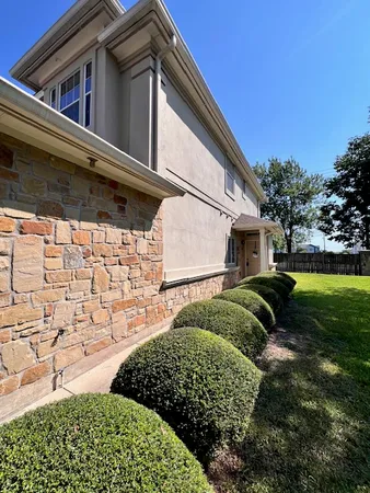 a house view with a backyard space