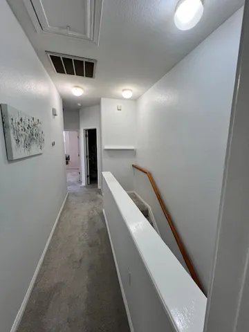 a hallway with stairs
