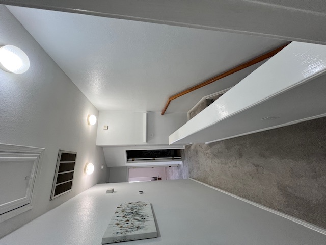 1101 East Parmer Lane, Unit 306 Austin, TX 78753 - Photo 23 of 30 a hallway with stairs