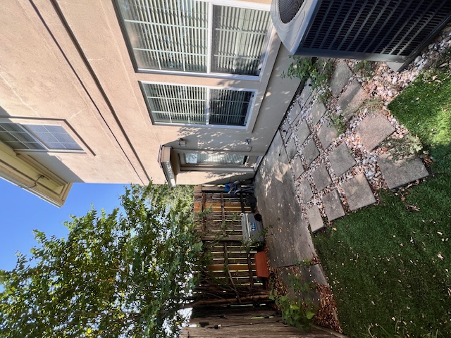 1101 East Parmer Lane, Unit 306 Austin, TX 78753 - Photo 28 of 30 a view of a house with backyard and sitting area