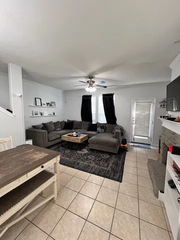 a kitchen with a sink and a stove top oven