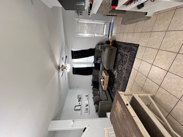 1101 East Parmer Lane, Unit 306 Austin, TX 78753 - Photo 4 of 30 a kitchen with a sink and a stove top oven