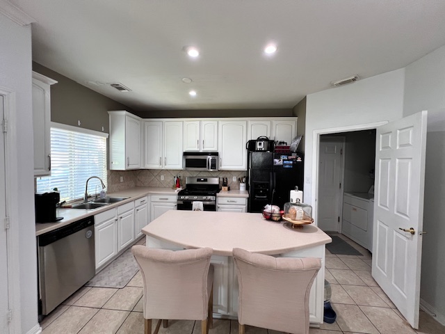 1101 East Parmer Lane, Unit 306 Austin, TX 78753 - Photo 8 of 30 a kitchen that has a sink and cabinets