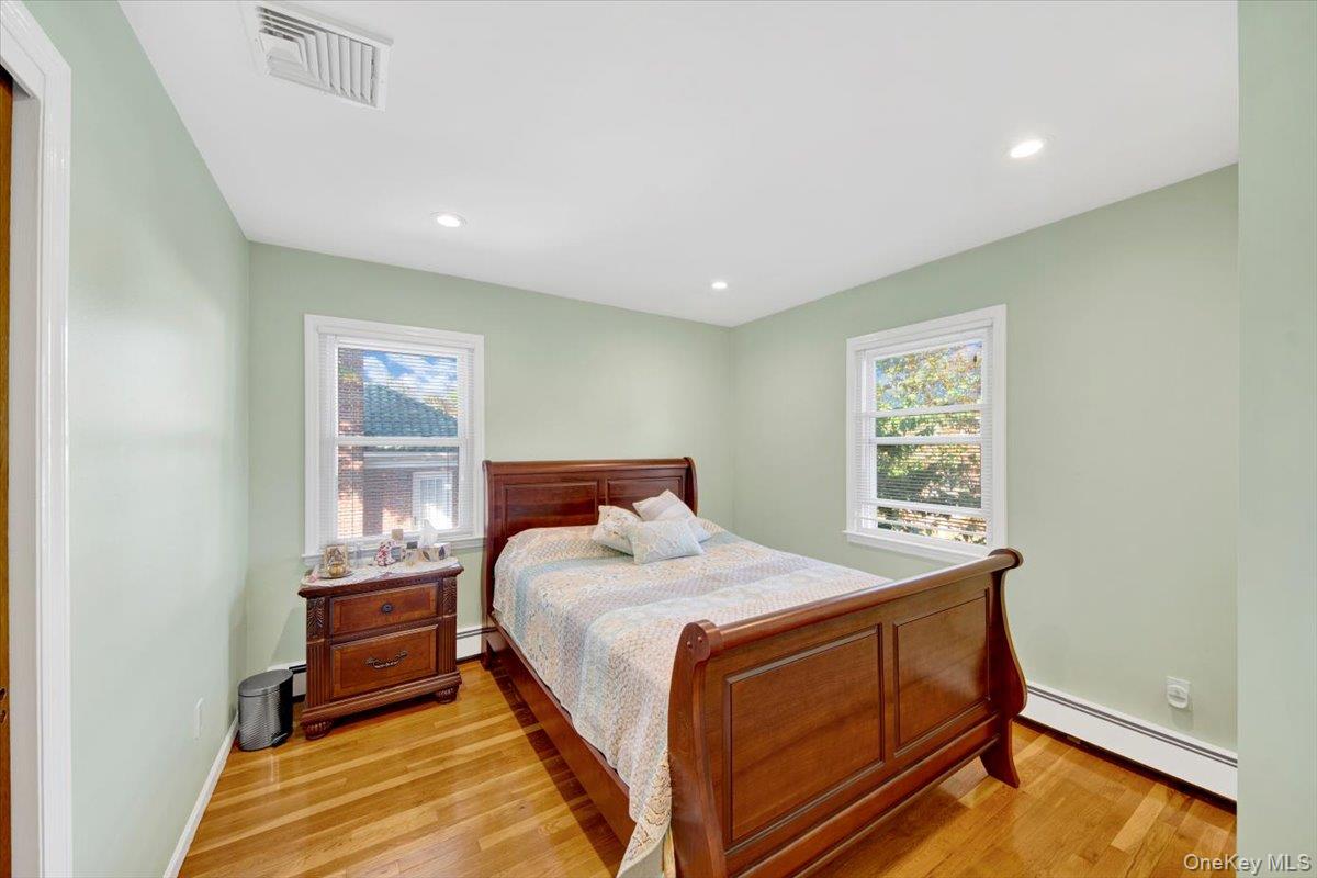 39 Deshon Avenue Bronxville, NY 10708 - Photo 16 of 30 a bedroom with a bed and a window