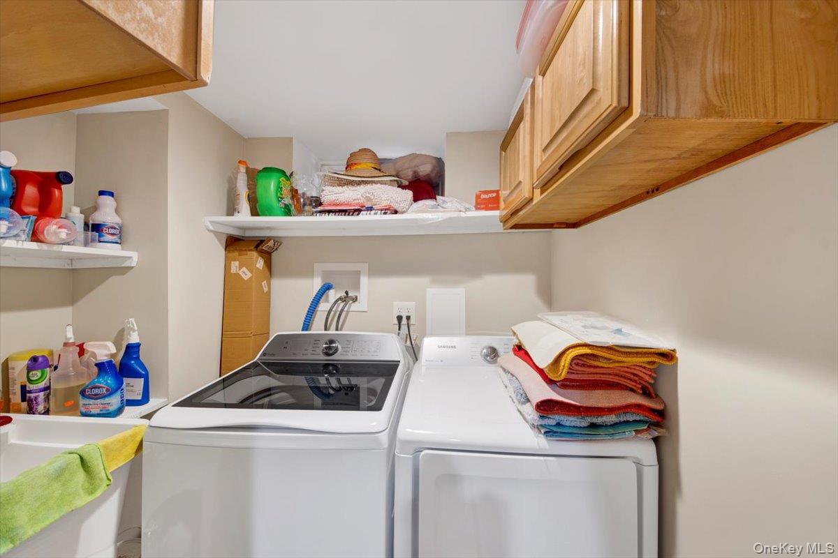 39 Deshon Avenue Bronxville, NY 10708 - Photo 22 of 30 a utility room with dryer and washer
