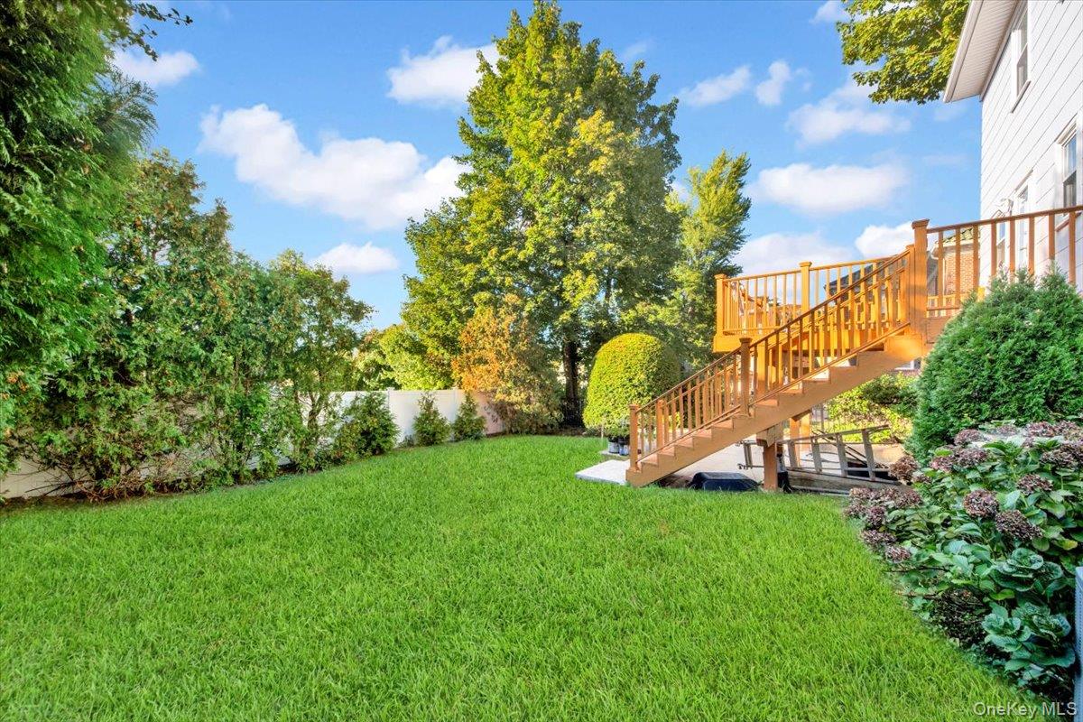 39 Deshon Avenue Bronxville, NY 10708 - Photo 25 of 30 a view of a garden with a slide