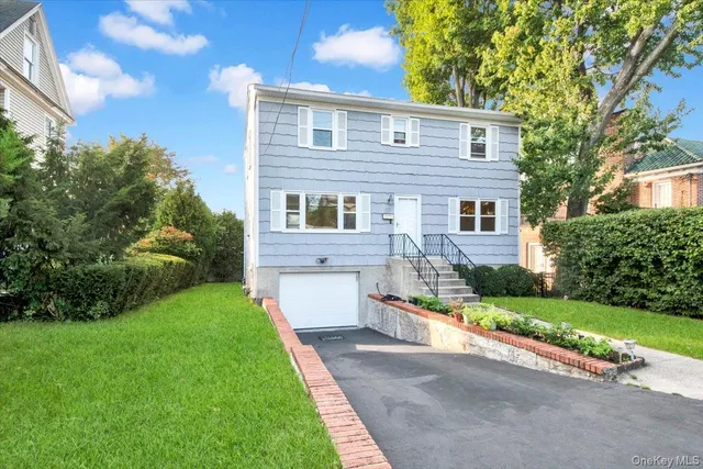 a front view of house with yard