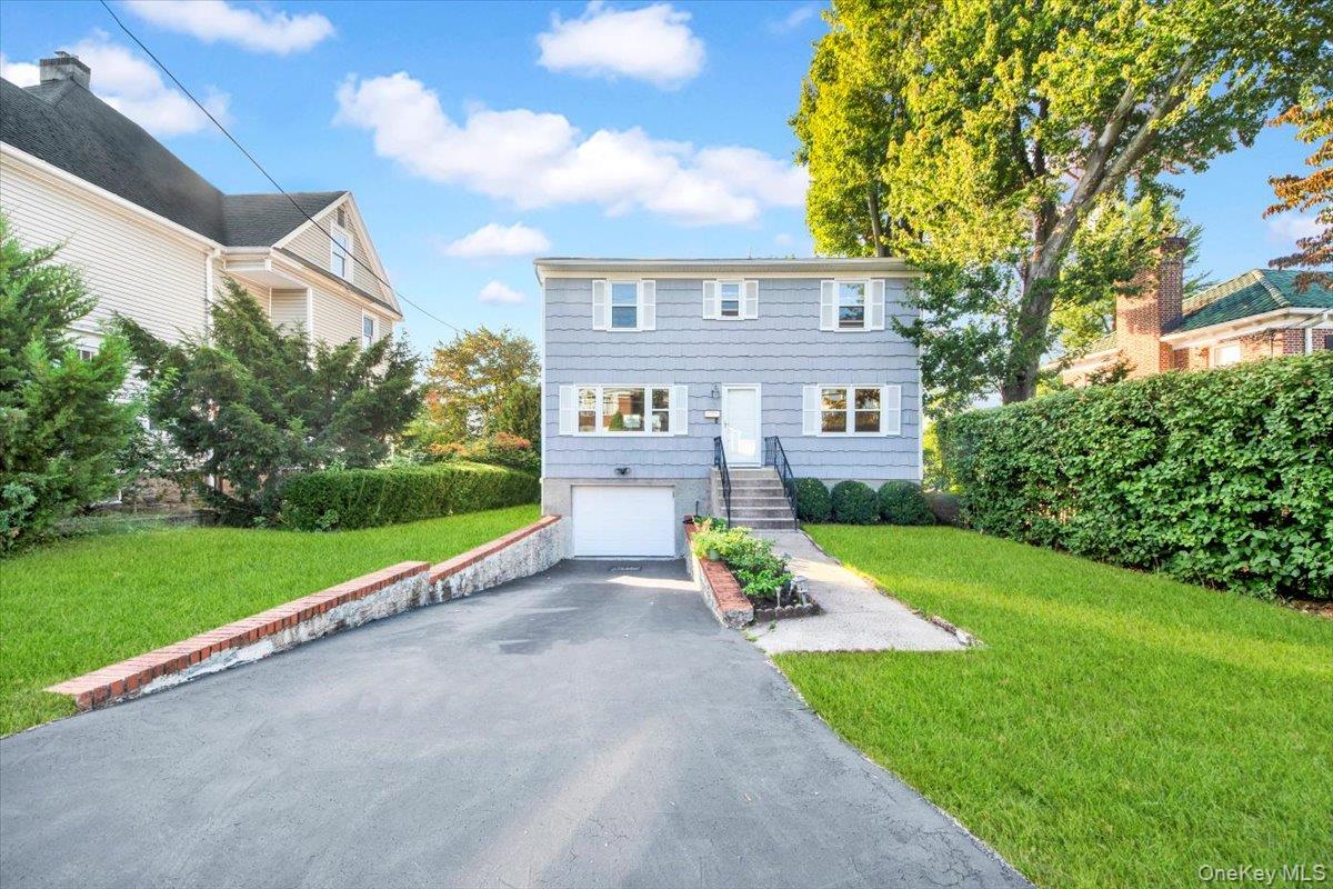 39 Deshon Avenue Bronxville, NY 10708 - Photo 6 of 30 a view of a house with a yard