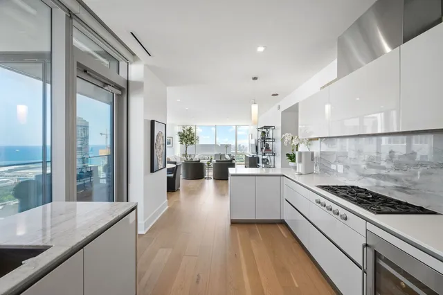 a kitchen with sink and stove