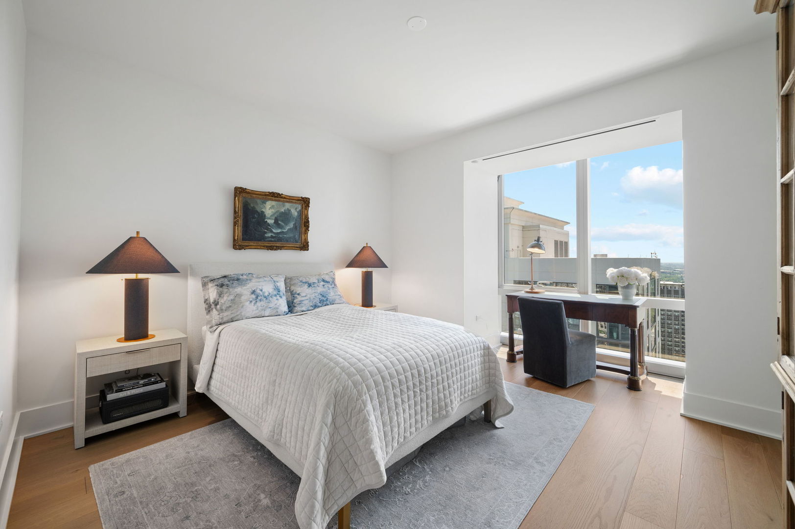 363 East Wacker Drive, Unit 3109 Chicago, IL 60601 - Photo 19 of 24 a bedroom with a bed and a view of kitchen