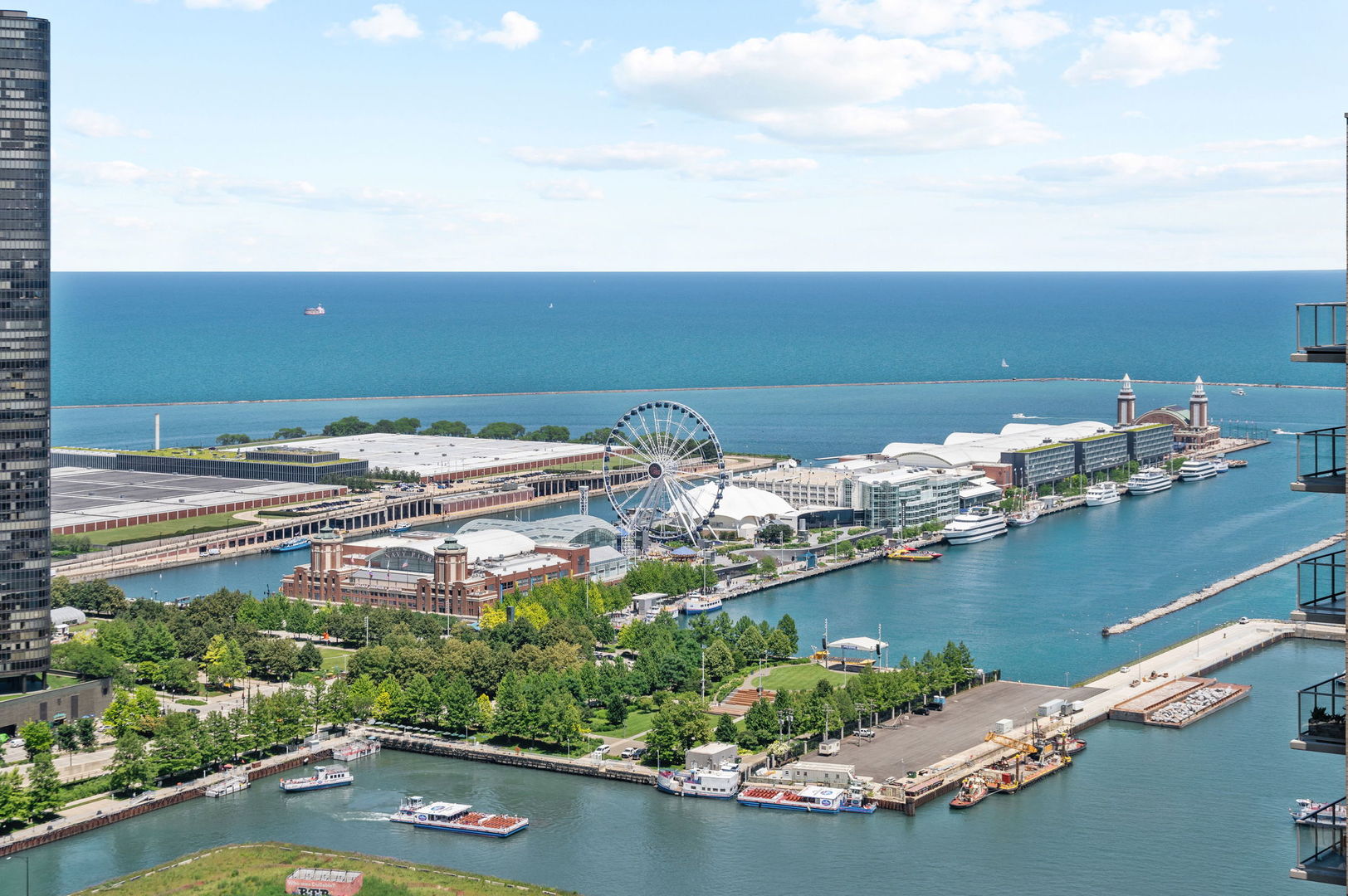 363 East Wacker Drive, Unit 3109 Chicago, IL 60601 - Photo 24 of 24 an aerial view of a house with a yard lake table and chairs