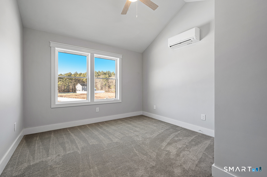 121 New Road Thompson, CT 06277 - Photo 24 of 40 a view of an empty room with a window