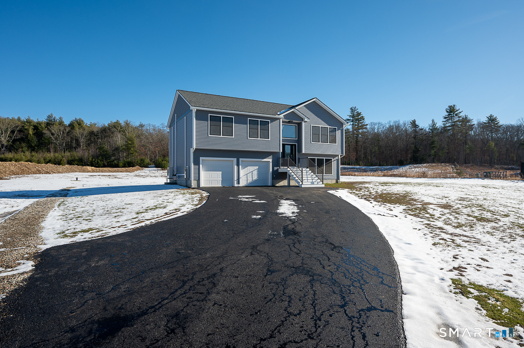 121 New Road Thompson, CT 06277 - Photo 36 of 40 a house view with a outdoor space