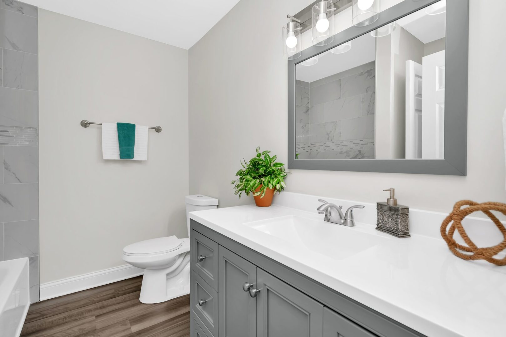 5332 Crescent Lane, Unit D Oak Forest, IL 60452 - Photo 11 of 17 a bathroom with a sink a toilet and mirror