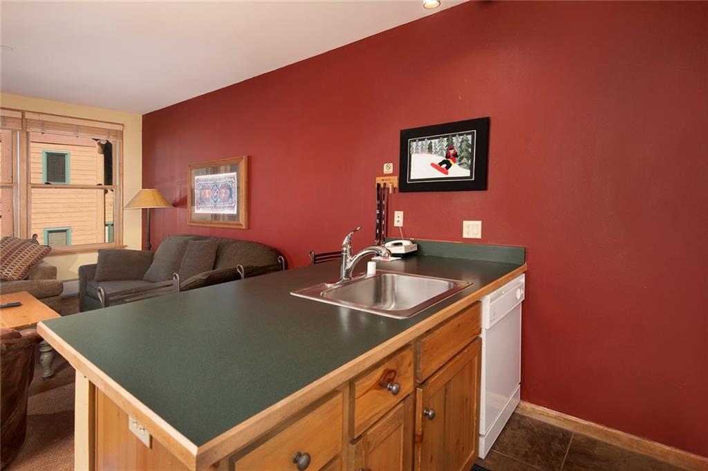129 River Run Road, Unit 8063 Keystone, CO 80435 - Photo 12 of 23 a view of a living room with a table and chairs