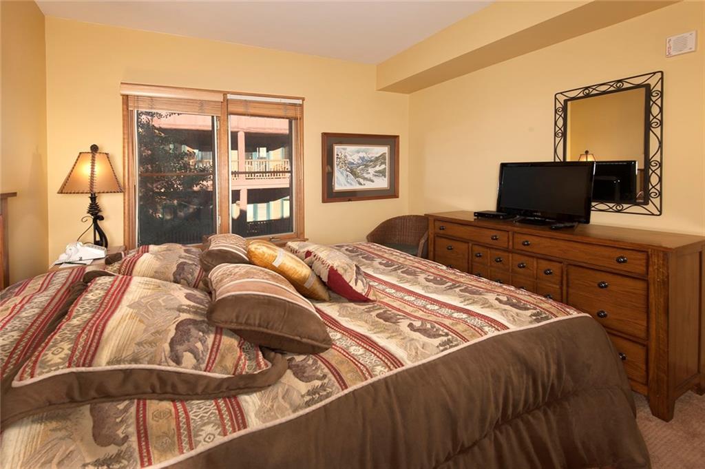 129 River Run Road, Unit 8063 Keystone, CO 80435 - Photo 7 of 23 a bedroom with a bed and window