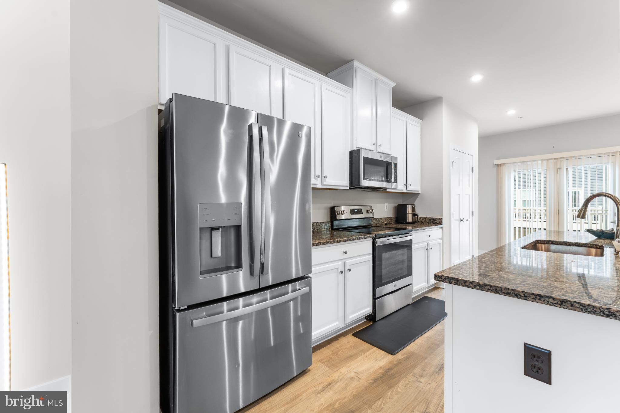 117 Hawlings River Road Laurel, MD 20708 - Photo 14 of 33 Modern kitchen with sleek stainless steel appli...