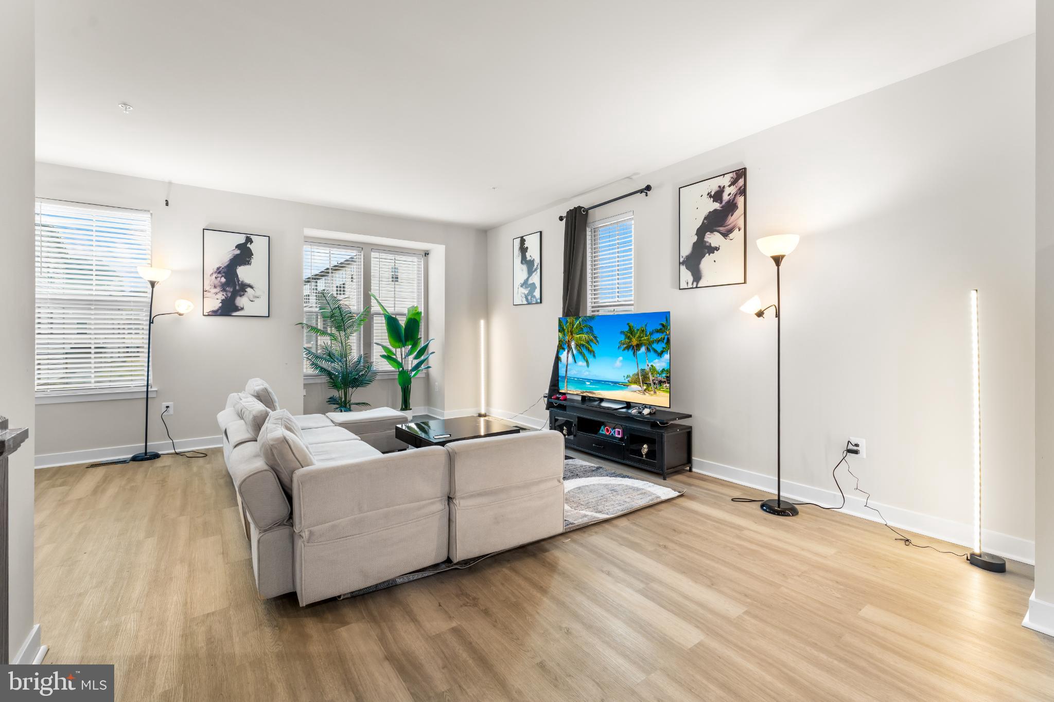 117 Hawlings River Road Laurel, MD 20708 - Photo 16 of 33 Bright and airy living space with modern flair.