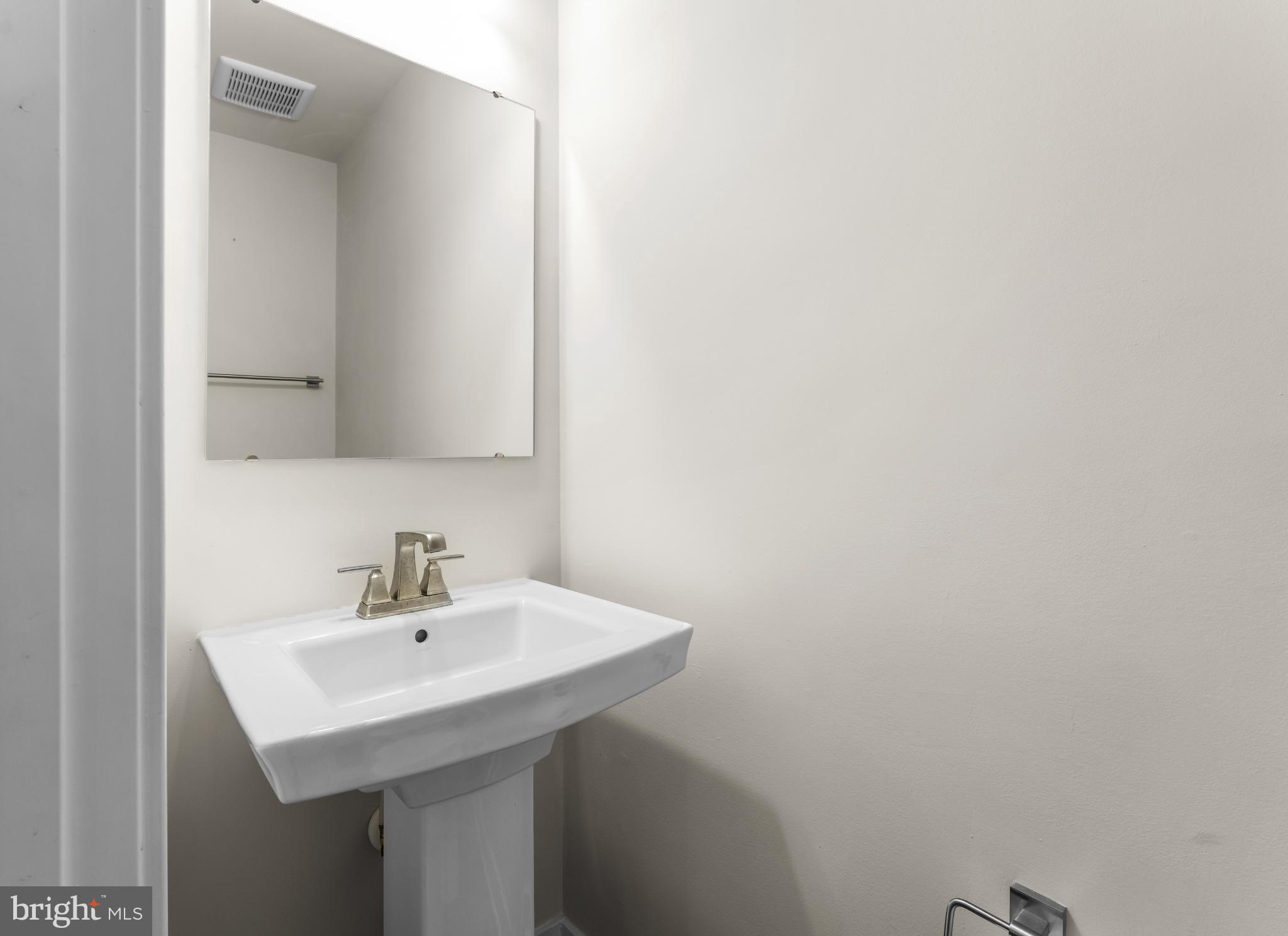 117 Hawlings River Road Laurel, MD 20708 - Photo 20 of 33 Sleek and modern powder room design.