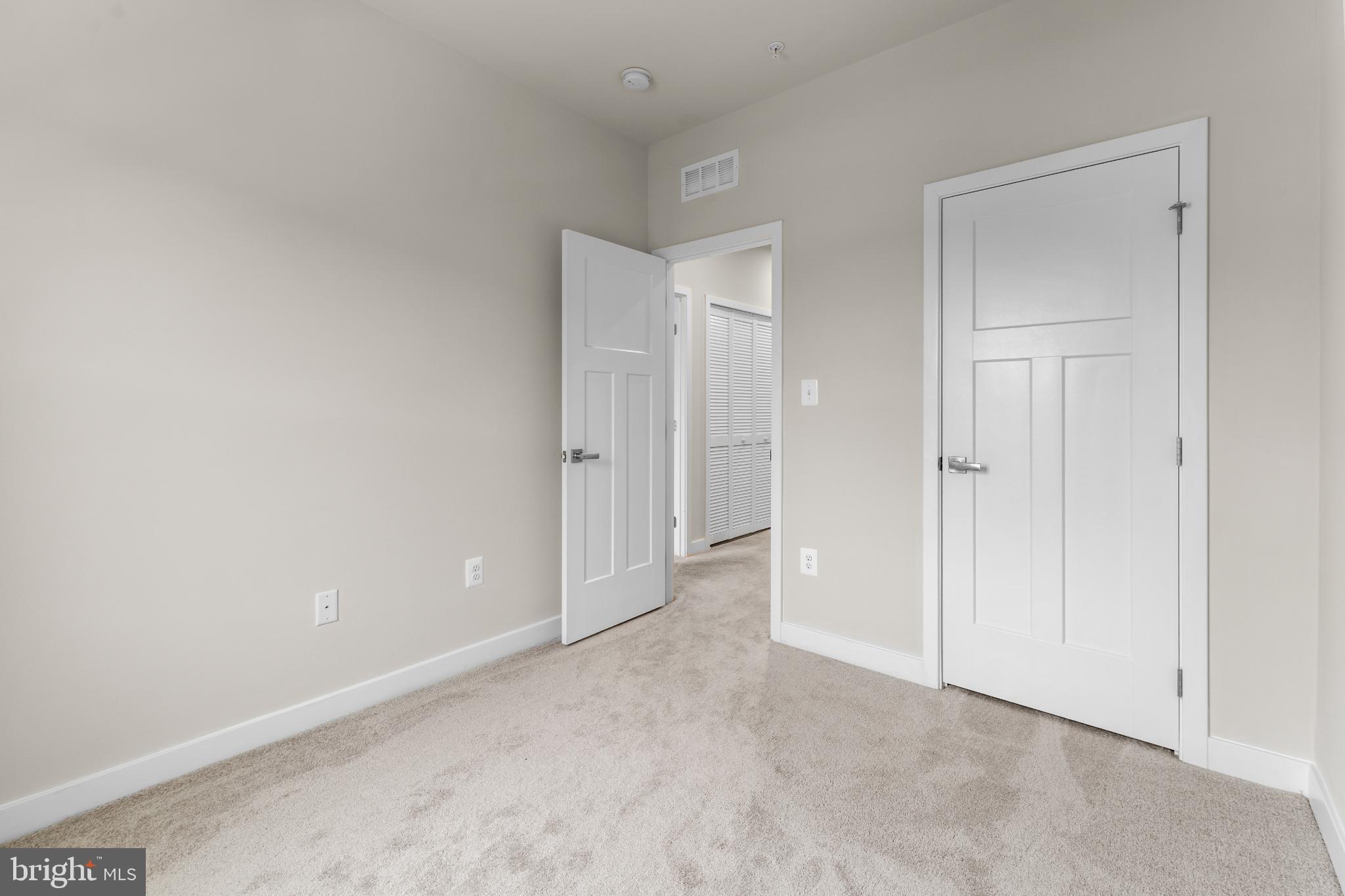 117 Hawlings River Road Laurel, MD 20708 - Photo 26 of 33 Bright and inviting space with modern doors.