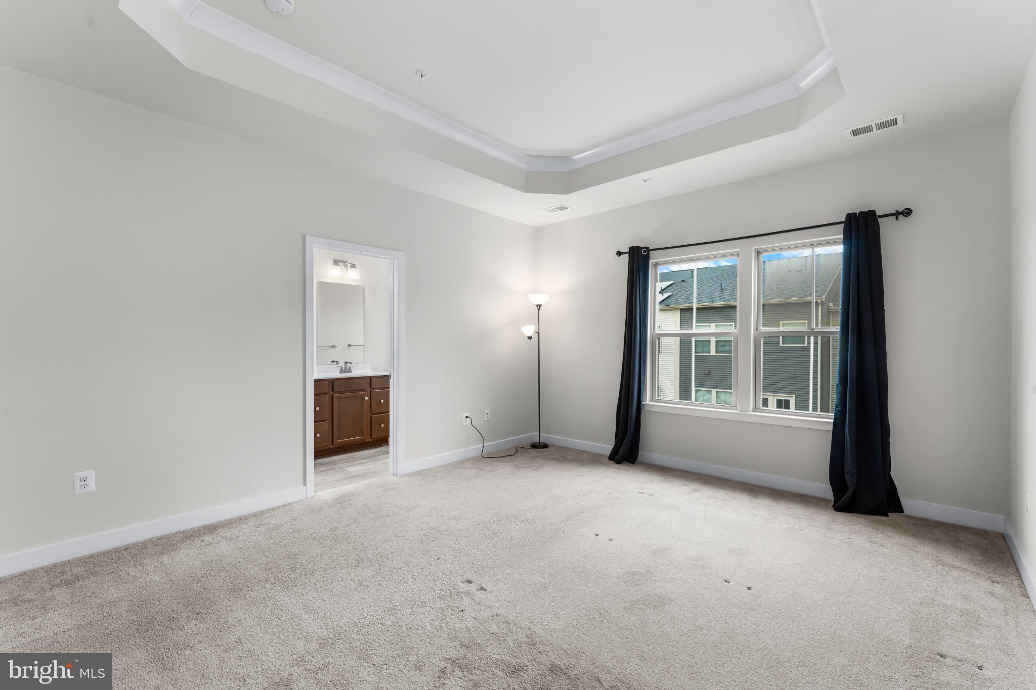 117 Hawlings River Road Laurel, MD 20708 - Photo 29 of 33 Primary bedroom with natural light and elegance.