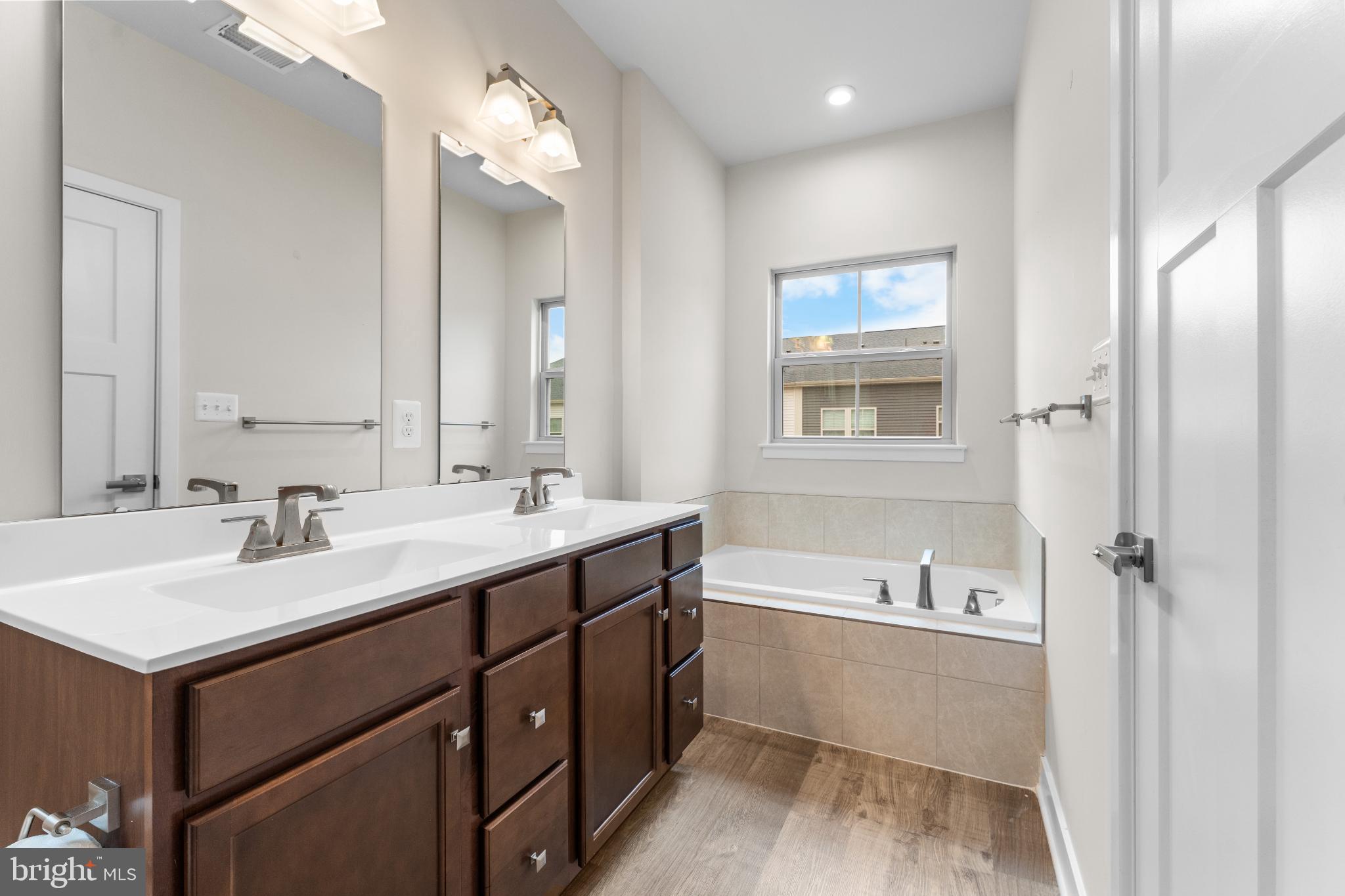117 Hawlings River Road Laurel, MD 20708 - Photo 32 of 33 Elegant bathroom with dual vanities and natural...