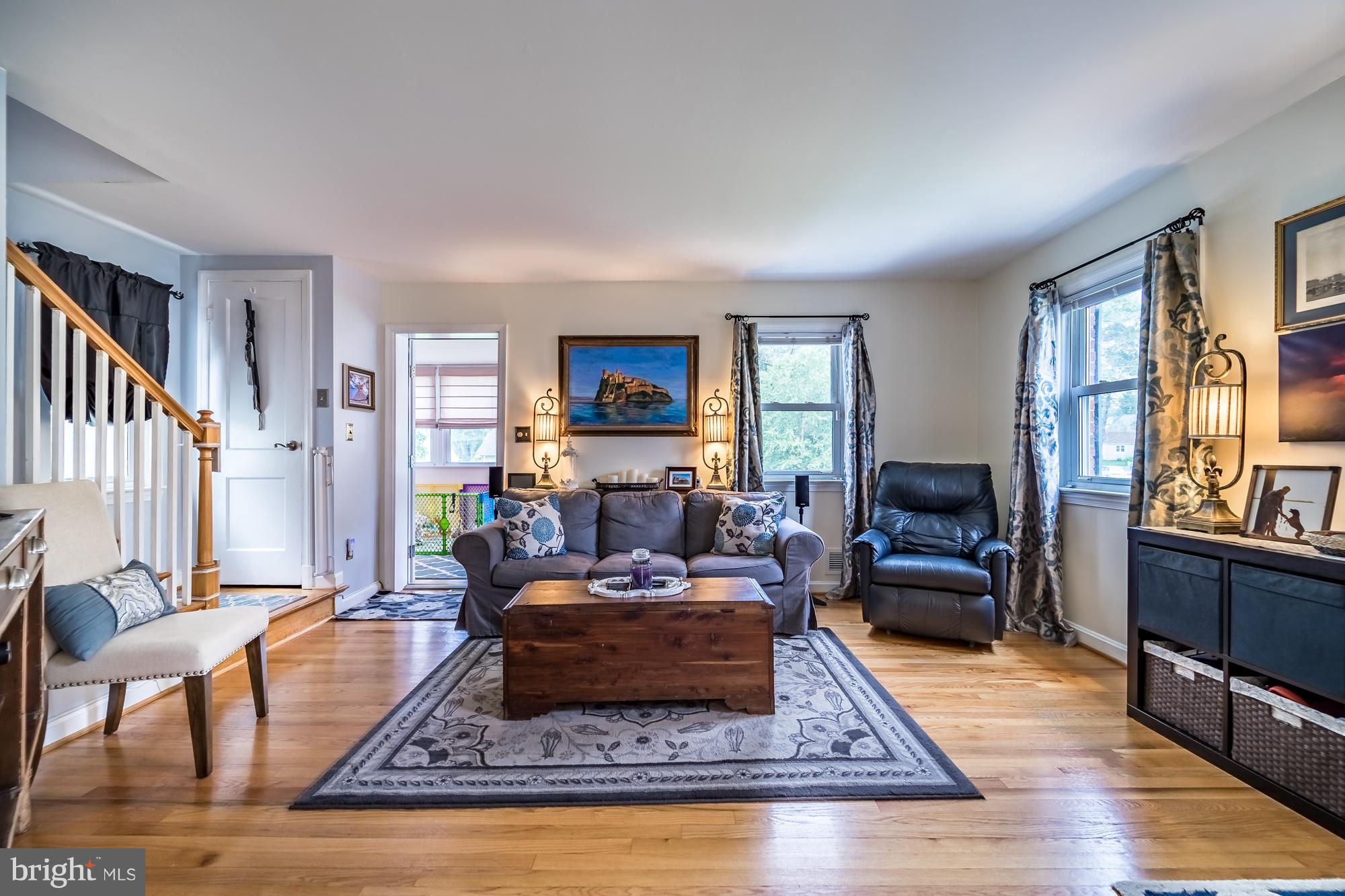 1603 Moffet Road Silver Spring, MD 20903 - Photo 16 of 30 a living room with furniture rug and window
