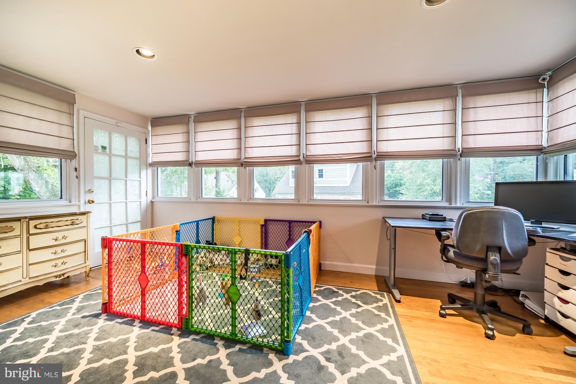 1603 Moffet Road Silver Spring, MD 20903 - Photo 18 of 30 a view of a workspace with furniture and a window