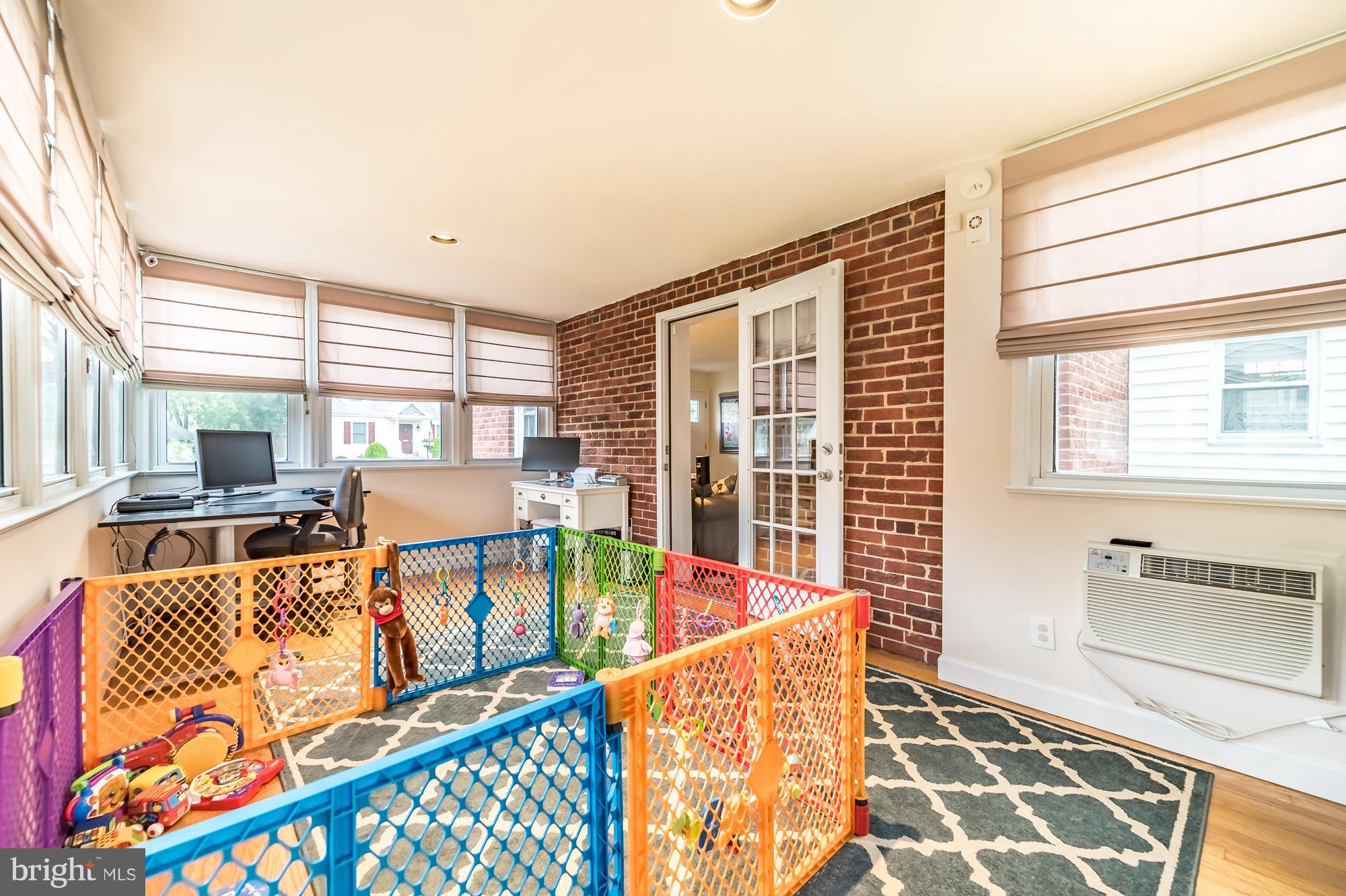 1603 Moffet Road Silver Spring, MD 20903 - Photo 19 of 30 a living room with furniture and a table