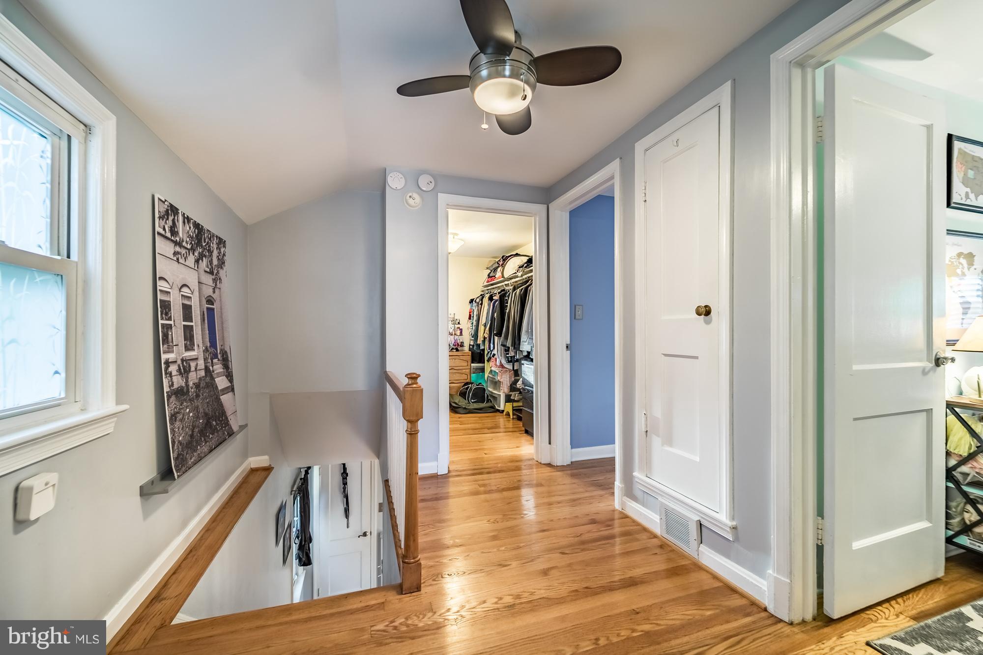 1603 Moffet Road Silver Spring, MD 20903 - Photo 20 of 30 a view of a hallway view with wooden floor and staircase