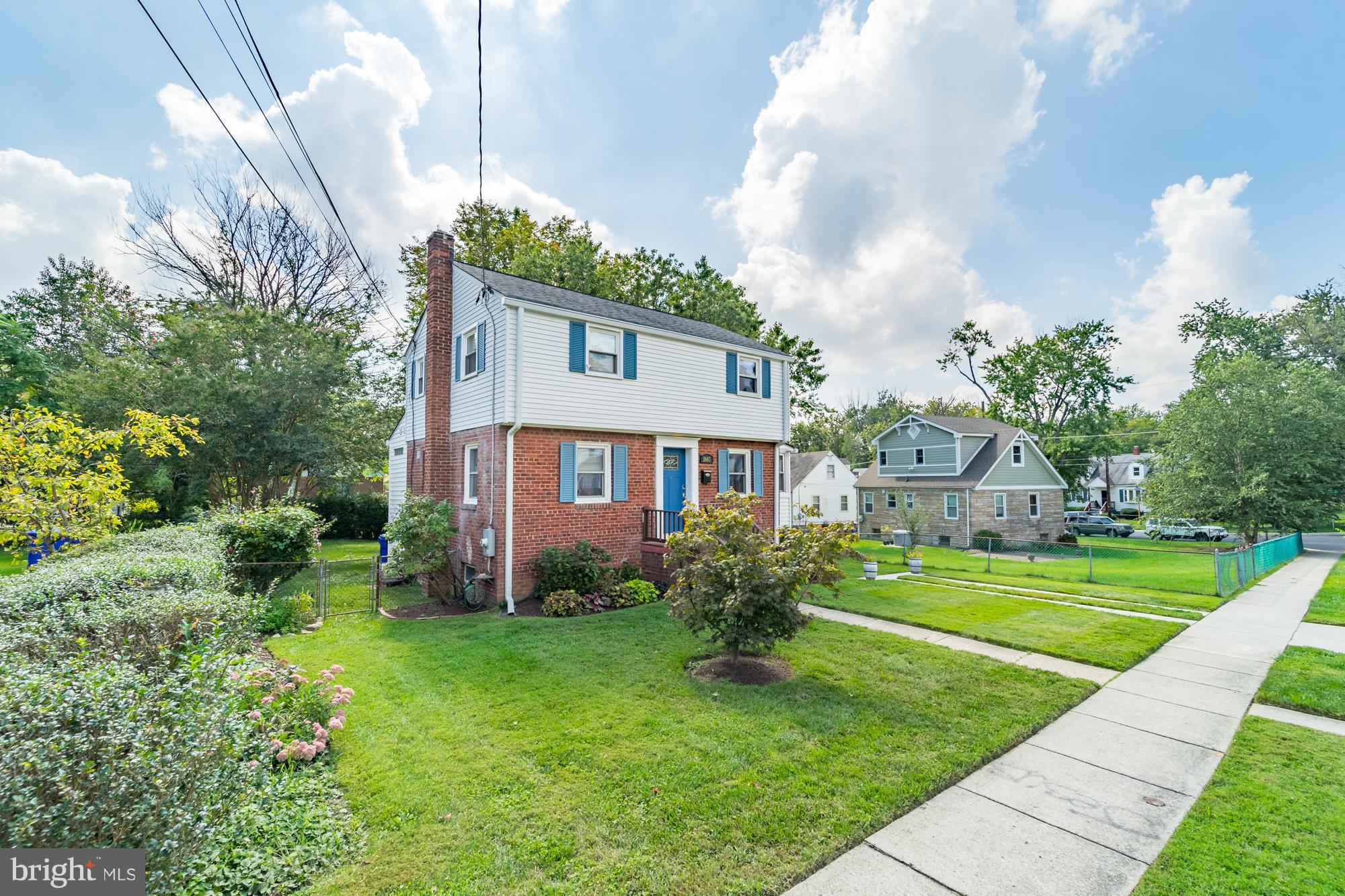 1603 Moffet Road Silver Spring, MD 20903 - Photo 2 of 30 a front view of a house with garden