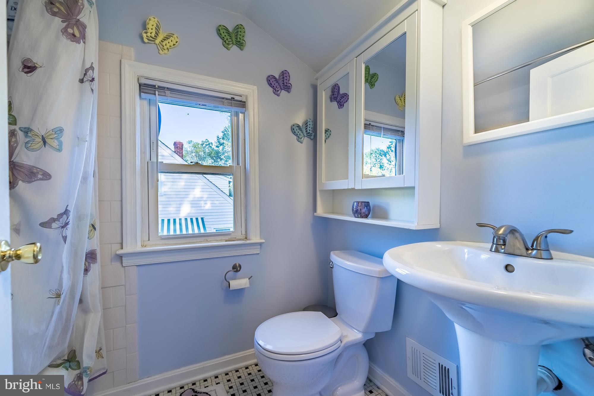 1603 Moffet Road Silver Spring, MD 20903 - Photo 23 of 30 a bathroom with a sink and a toilet