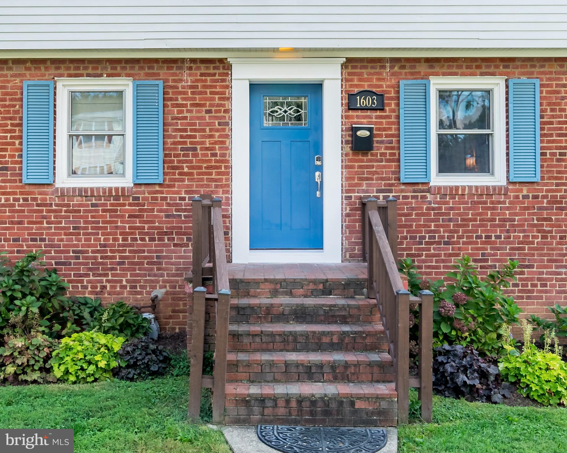 1603 Moffet Road Silver Spring, MD 20903 - Photo 5 of 30 front view of a house with a garden