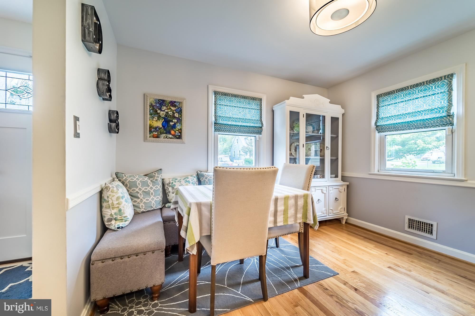 1603 Moffet Road Silver Spring, MD 20903 - Photo 8 of 30 a dining room with furniture and wooden floor