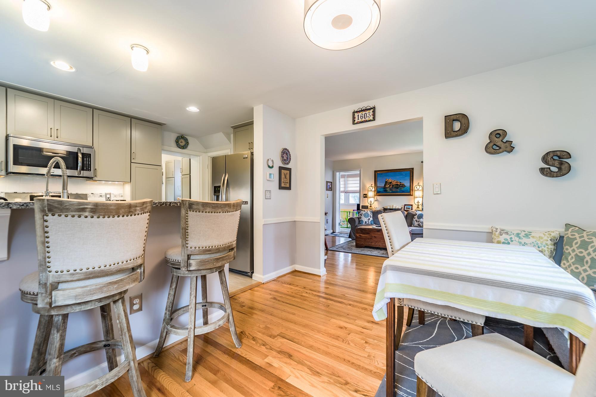 1603 Moffet Road Silver Spring, MD 20903 - Photo 9 of 30 a view of a dining room with furniture