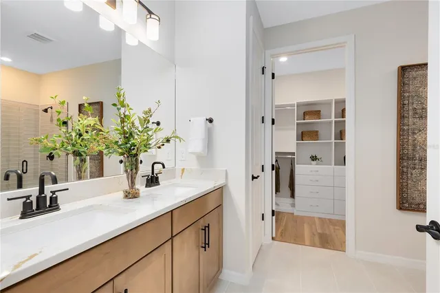 a en suite bathroom with a tub and shower