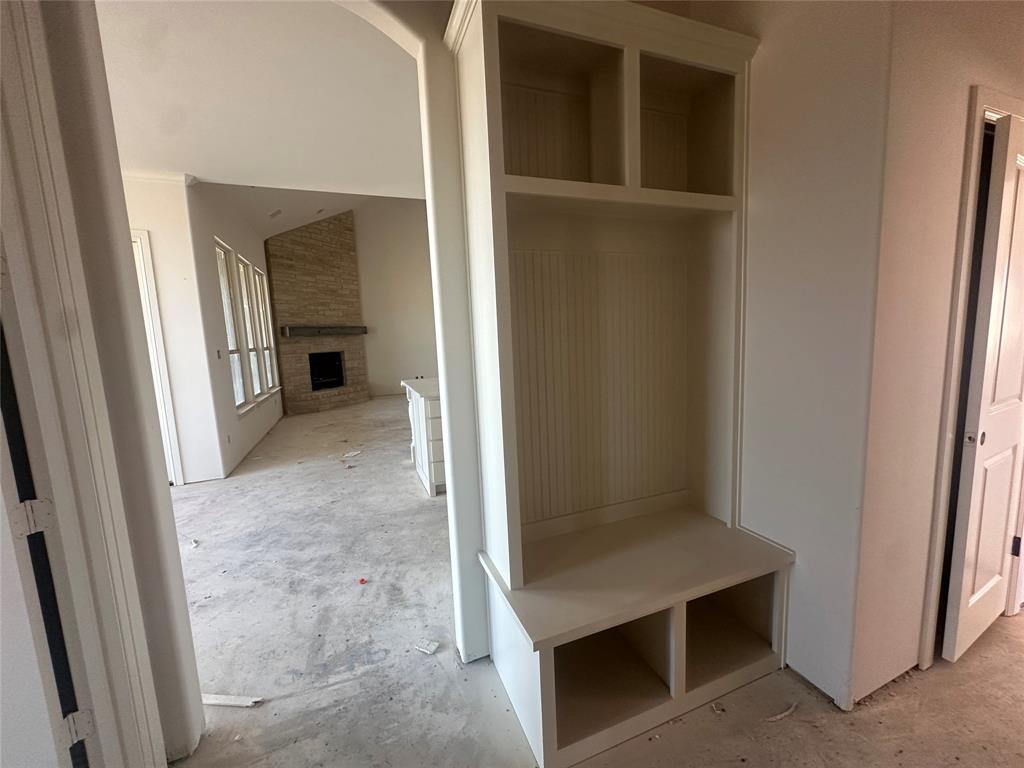 9424 Bluestem Lane DISH, TX 76247 - Photo 17 of 23 Mud Bench and half bath off garage entrance