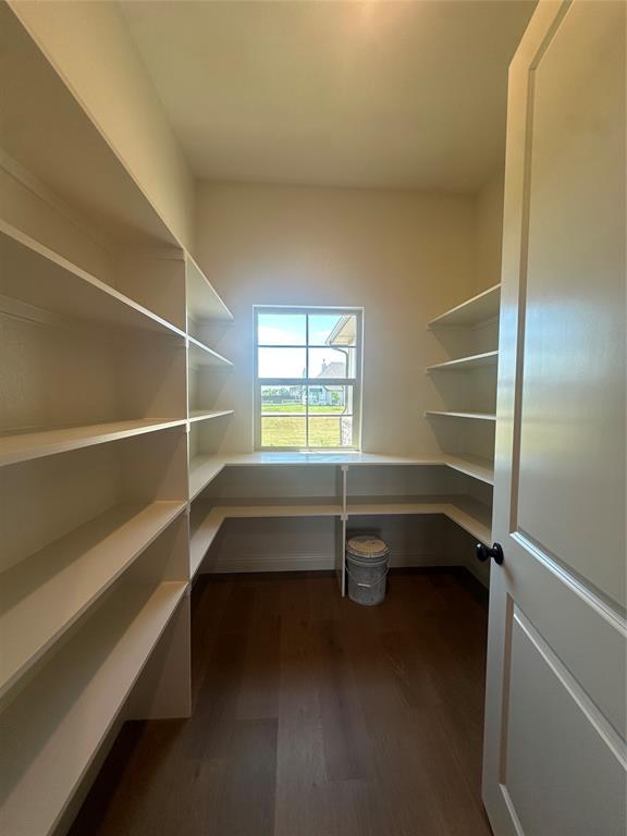 9424 Bluestem Lane DISH, TX 76247 - Photo 17 of 28 a view of room with window and wooden floor