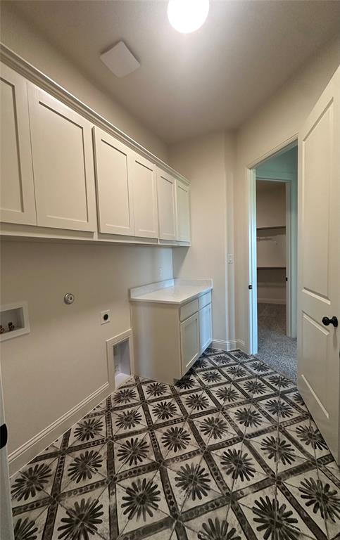 9424 Bluestem Lane DISH, TX 76247 - Photo 20 of 28 a kitchen with a stove and a refrigerator