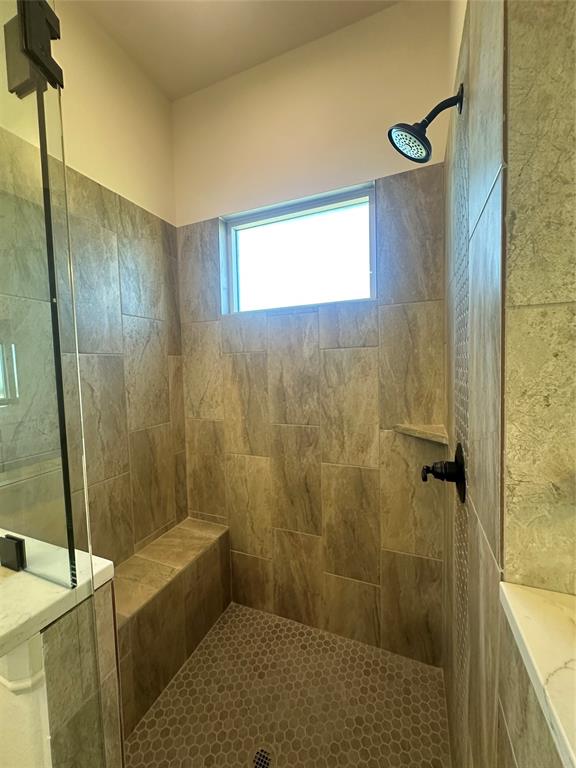 9424 Bluestem Lane DISH, TX 76247 - Photo 24 of 28 a bathroom with a shower and a sink