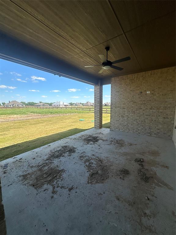 9424 Bluestem Lane DISH, TX 76247 - Photo 28 of 28 a view of an empty room with a ceiling fan and window