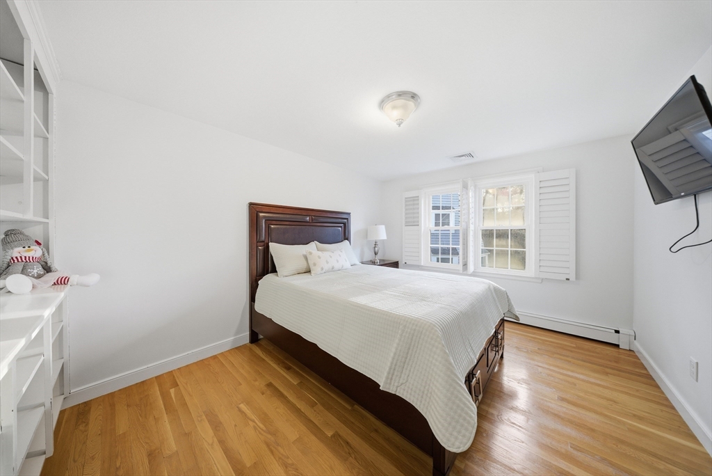 329 Orchard Street Millis, MA 02054 - Photo 18 of 42 a bedroom with a bed and a window