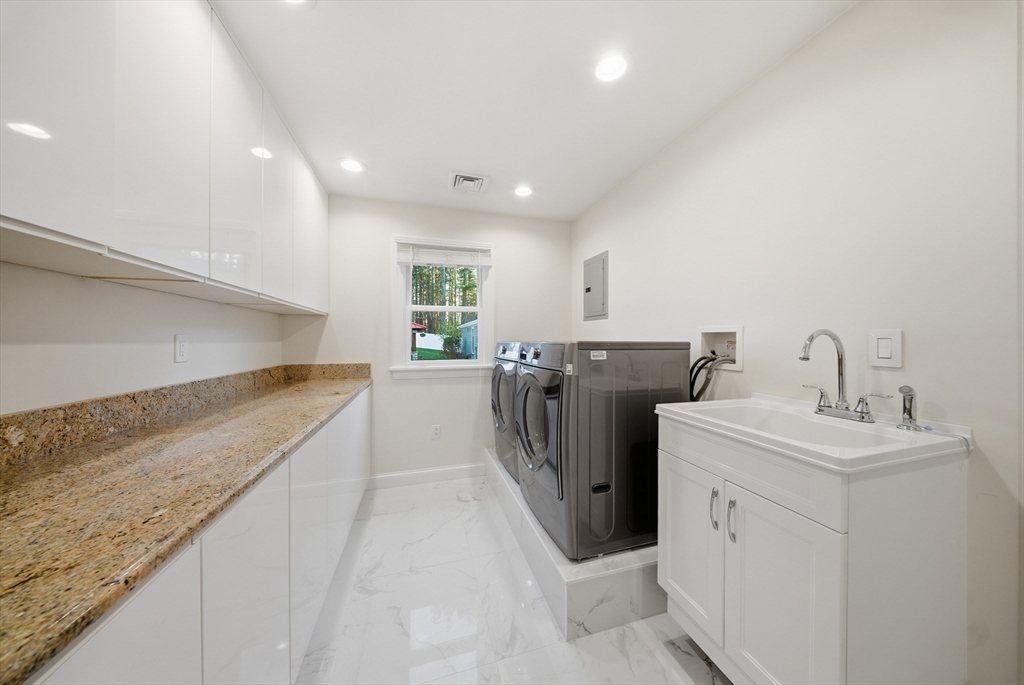 329 Orchard Street Millis, MA 02054 - Photo 22 of 42 a view of a kitchen with utility area