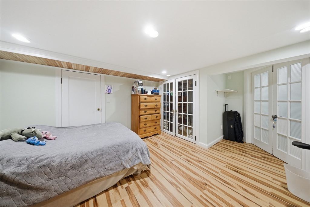 329 Orchard Street Millis, MA 02054 - Photo 28 of 42 a bedroom with a large bed and a window