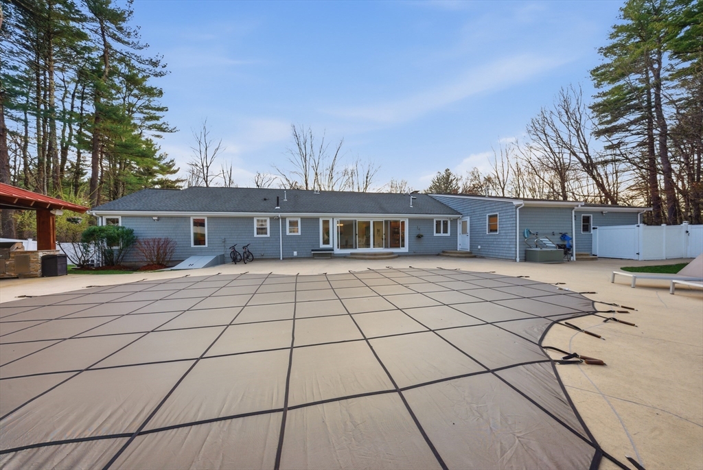 329 Orchard Street Millis, MA 02054 - Photo 32 of 42 a front view of house with yard and trees around