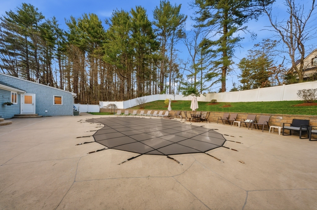 329 Orchard Street Millis, MA 02054 - Photo 33 of 42 a view of a yard with cars