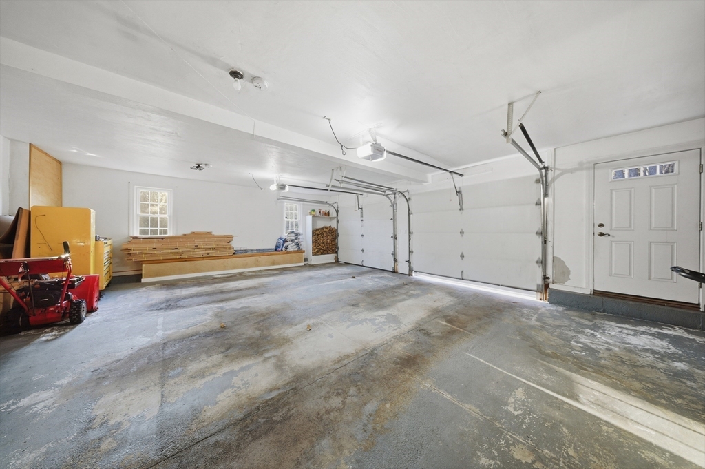 329 Orchard Street Millis, MA 02054 - Photo 37 of 42 a view of a livingroom with walk in closet and storage
